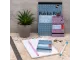 Pukka Pads Metallic A7 Top Spiral Pocket Notebook 100 Page in blue shown in a stationery lifestyle setting
