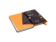 Pukka Bloom A5 Softcover Lined Notebook open at an angle showing orange inside cover