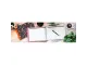 Pukka Bloom Visitor Book open on a desk with floral cover visible