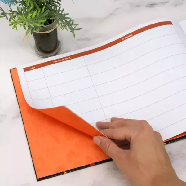Pukka Bloom Visitor Book with black floral cover shown from the front