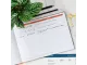 Pukka Bloom A4 Visitors Book Desk Lifestyle View Pukka Bloom A4 Visitors Book open on a desk with stationery and plants